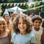 Close up photo of a group of small and big kids at a backyard birthday party